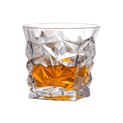 whisky rock glass titled crocodile with whisky